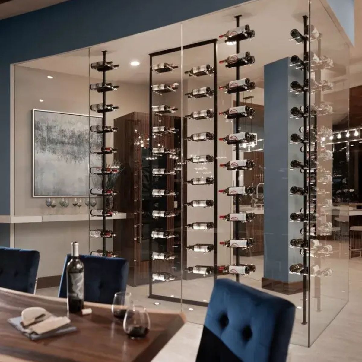 floating wine rack system with glass enclosure and floor-to-ceiling posts in dining space