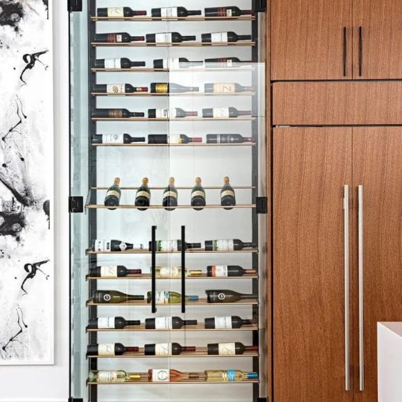 Wine rack with bottles inside a wooden cabinet