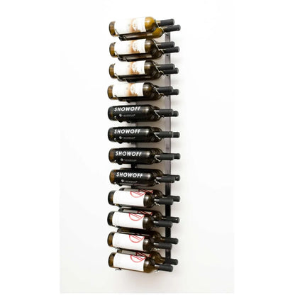 Wall-mounted wine rack with wine bottles on a white background
