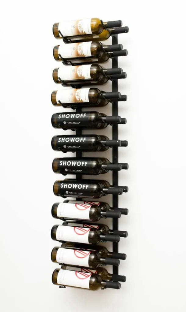 Wall-mounted wine rack with wine bottles on a white background