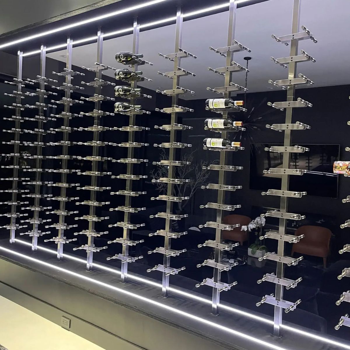 floating wine rack system with floor-to-ceiling posts and LED-lit wall display