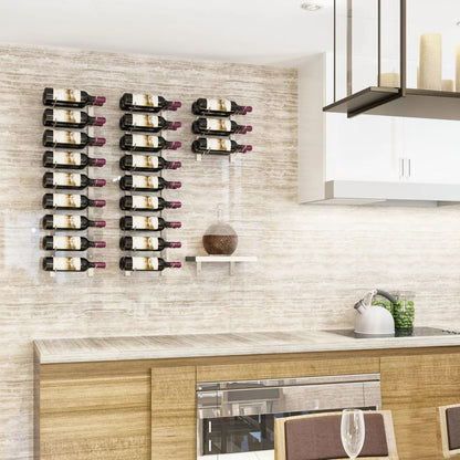 Wine bottles arranged on a wall-mounted rack in a modern kitchen.