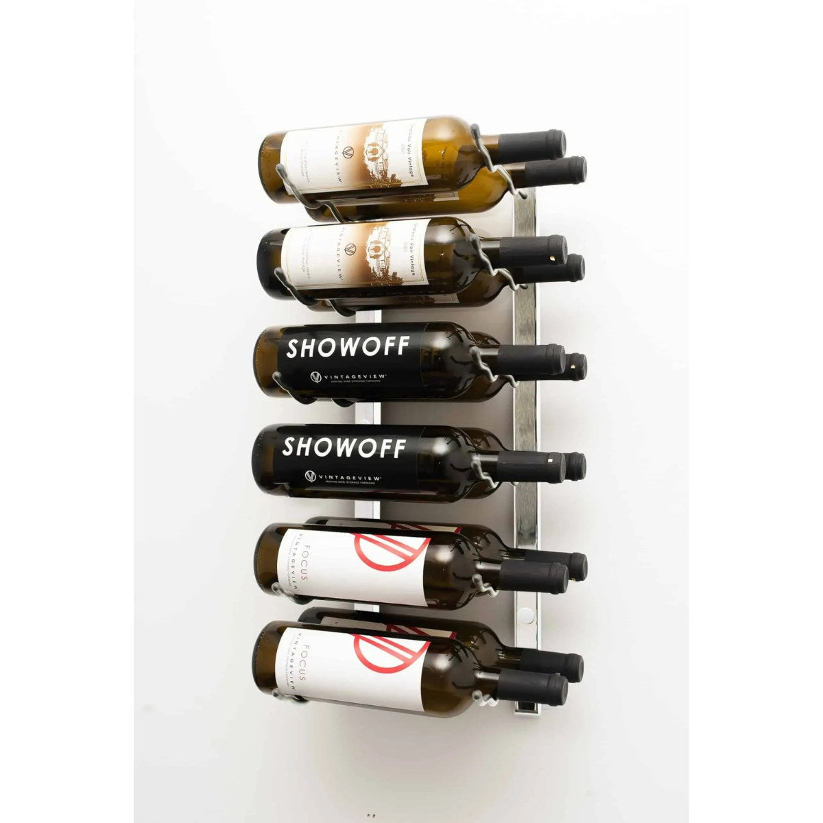 Wall-mounted wine rack with six bottles of Showoff wine on a white background